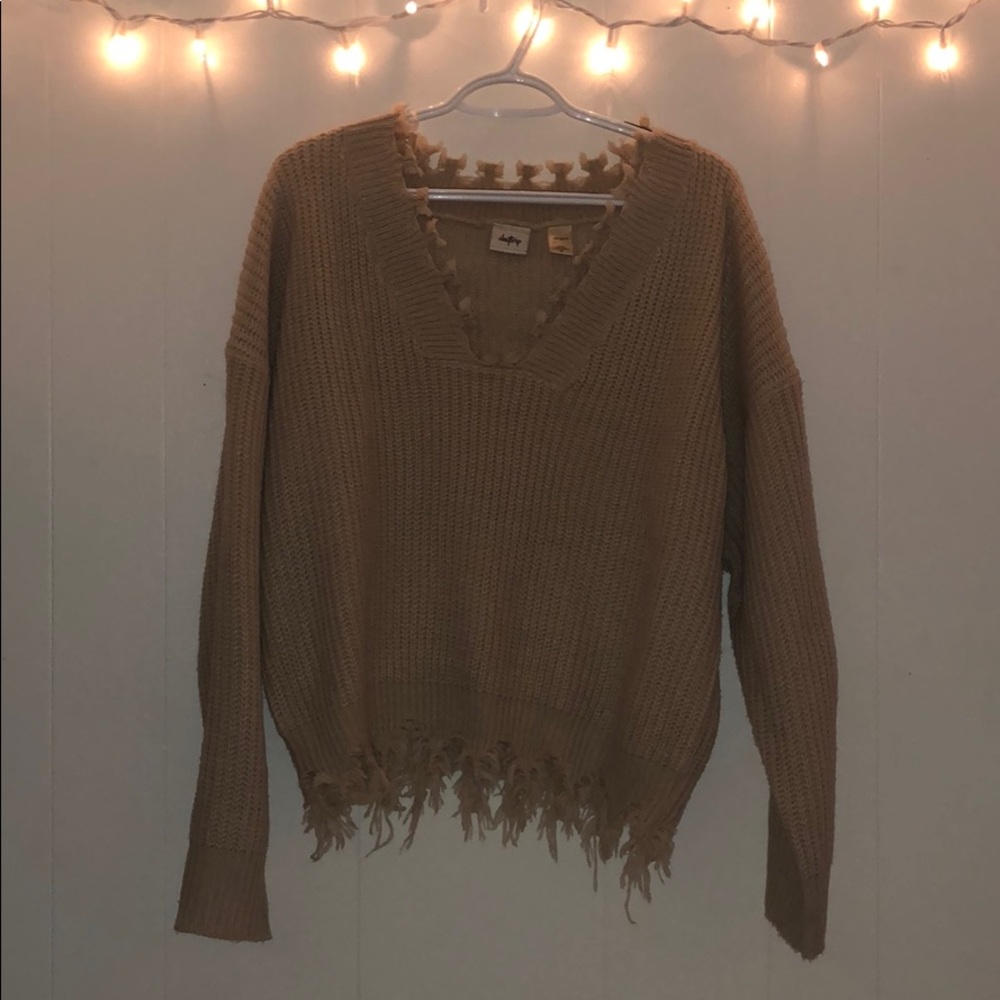 Distressed sweater